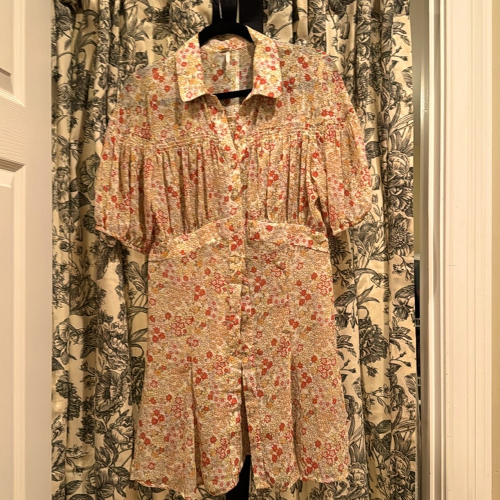 Cute button down sheer dress. Perfect with nude boots for fall.